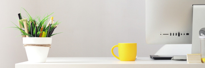 Yellow cup on desk